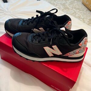 New Balance training sneakers with fun floral pattern.